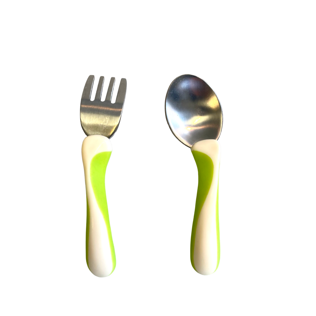 Ergonomic children’s spoon and fork set in green with angled fork tines and spoon bowl as well as curved handles